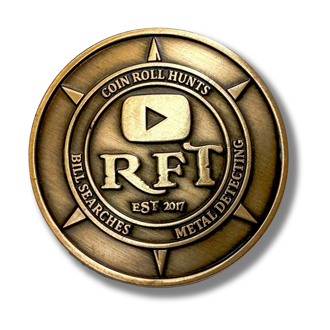 Rob Finds Treasure Bronze OG OLD LOGO Challenge Coin Flat lay, front side of coin