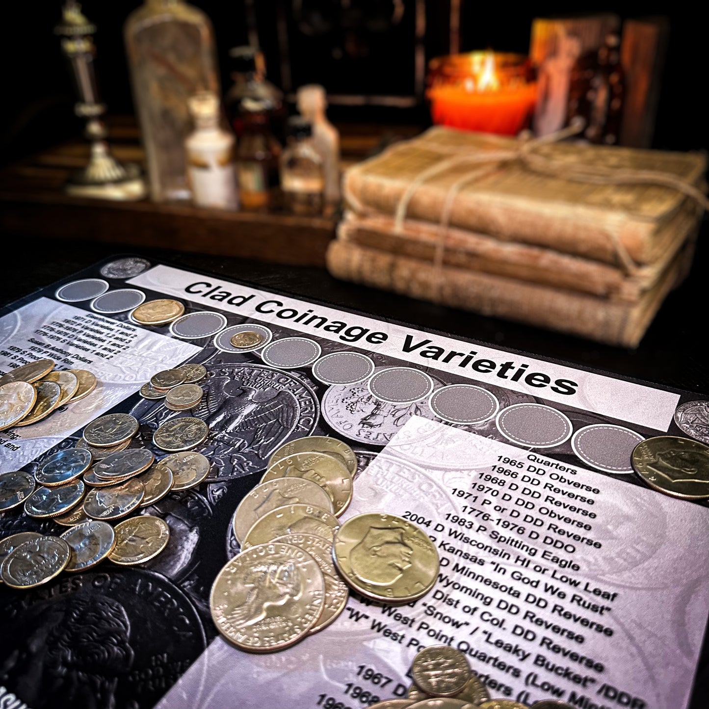 Layout with coins of a Clad Varieties coin roll hunting mat made by Rob Finds Treasure featuring organized rows for stacking Clad Variety finds, providing a convenient and systematic setup for searching through coins