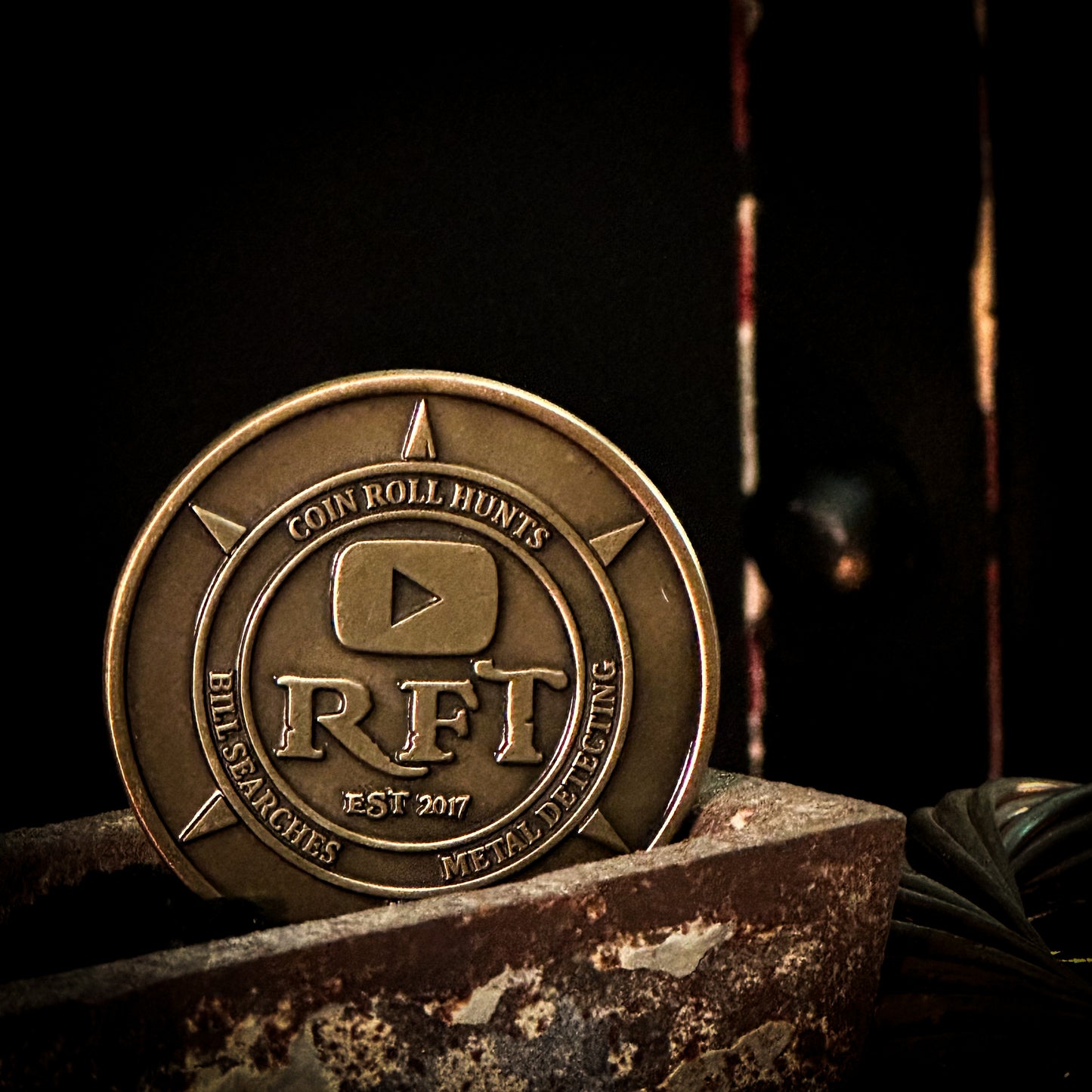 Rob Finds Treasure OG OLD LOGO Bronze Challenge Coin with background, front view