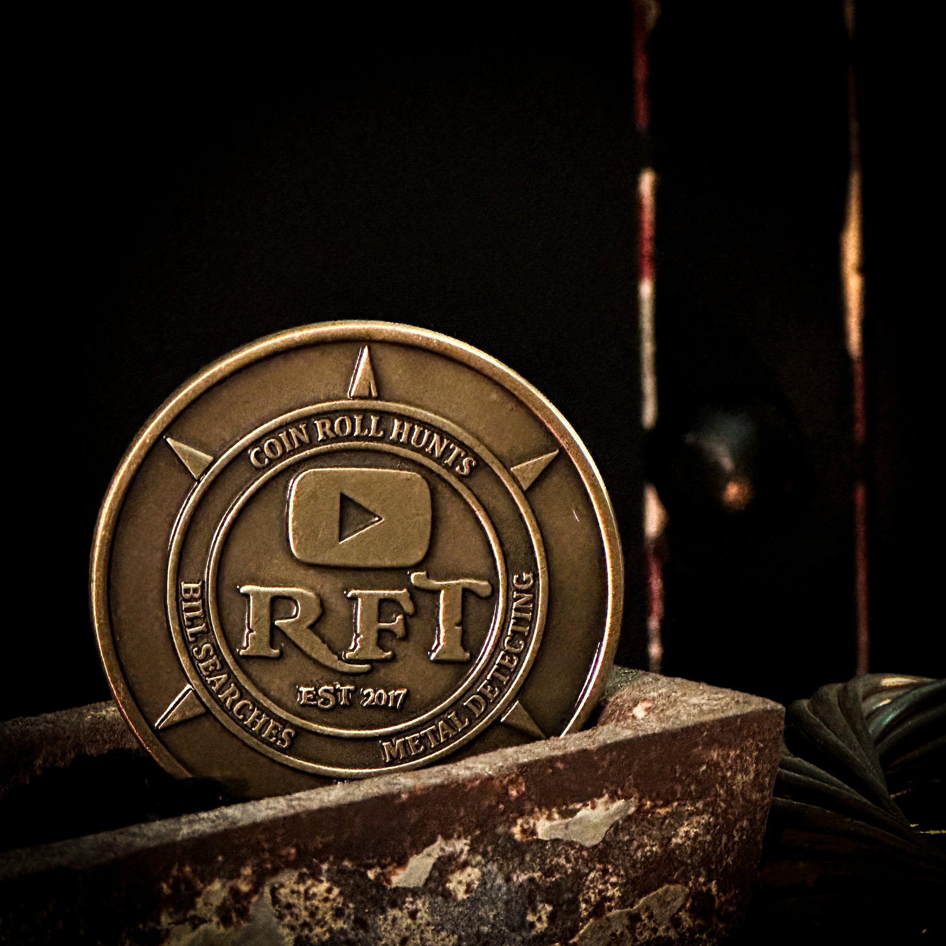 Rob Finds Treasure OG OLD LOGO Bronze Challenge Coin with background, front view