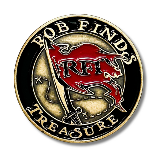 Rob Finds Treasure Bronze Challenge Coin Flat lay, front side of coin