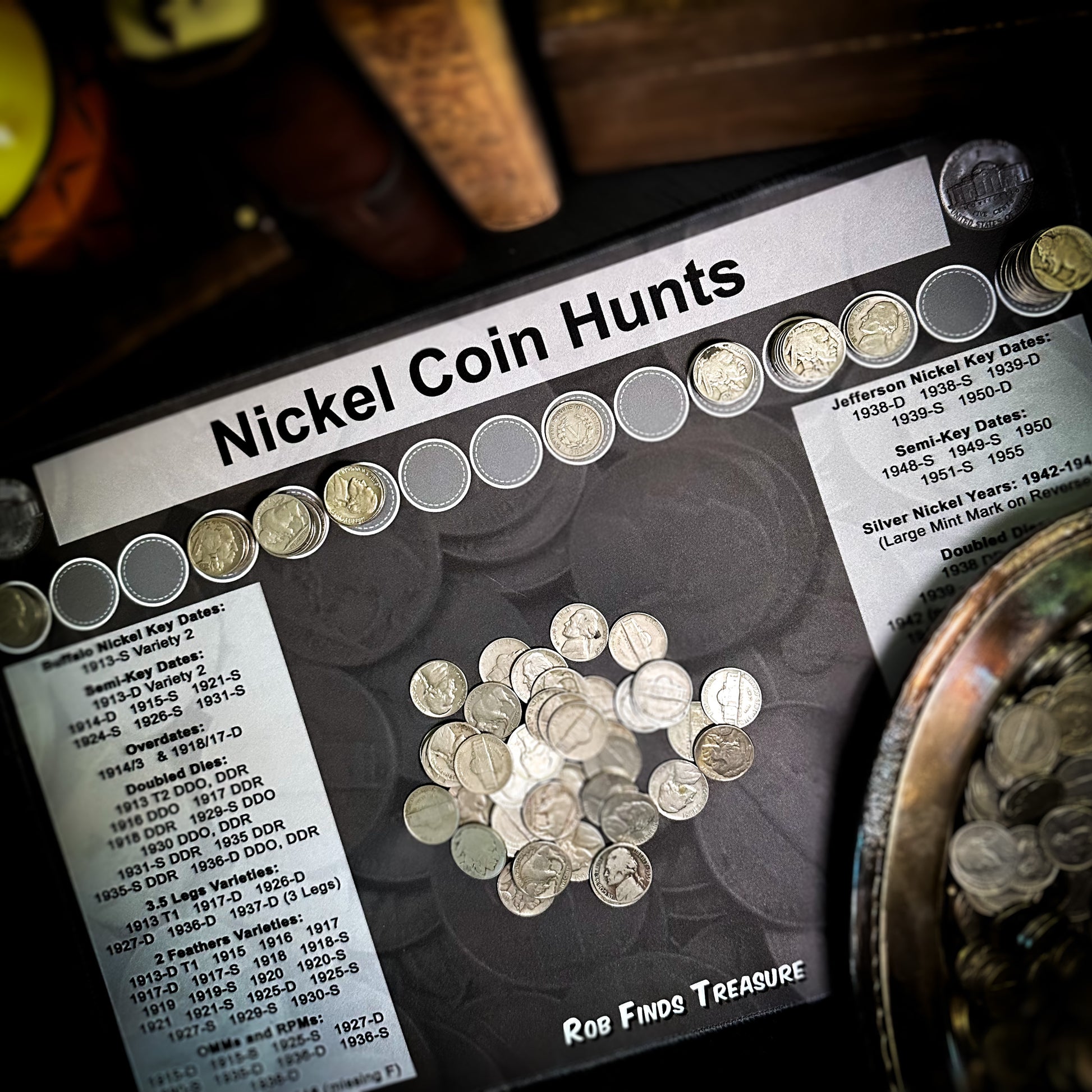 Layout with coins of a nickel coin roll hunting mat made by Rob Finds Treasure featuring organized rows for stacking nickels, providing a convenient and systematic setup for searching through coins 